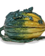 Earthenware. A DUTCH DELFT MELON-FORM BOX AND COVER ON FIXED STAND