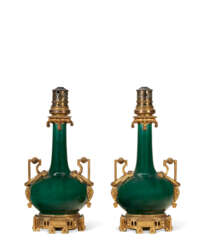A PAIR OF FRENCH ORMOLU-MOUNTED GREEN-GLAZED PORCELAIN TABLE LAMPS