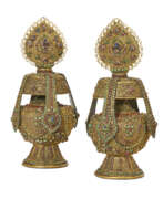 Nepal. A PAIR OF INLAID GILT-COPPER RITUAL WATER-POTS