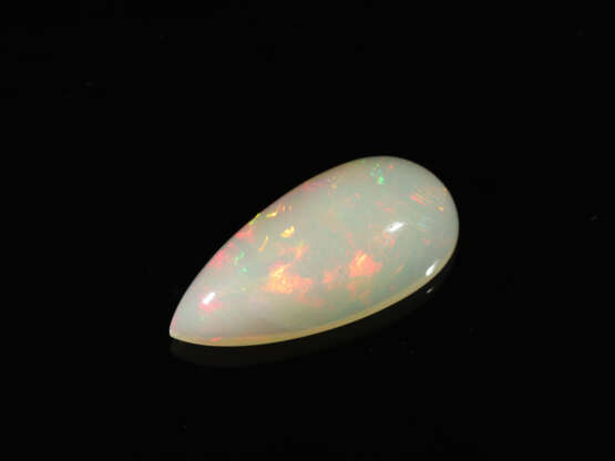 Opal: Schöner Opal-Cabochon in Tropfenform und mit tollem Farbspiel , ca. 20,5ct - фото 1