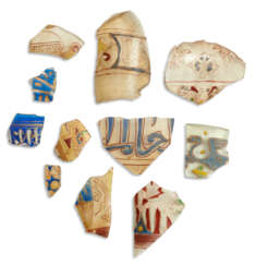 A GROUP OF ENAMELLED GLASS FRAGMENTS