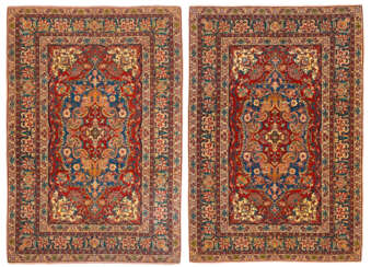 A PAIR OF ISFAHAN RUGS