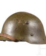 Militärische Kopfbedeckungen. Stahlhelm M 36