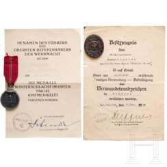 Besitzurkunde und Orden eines Verwundetenabzeichens und einer "Medaille Winterschlacht im Osten" für zwei SS-Rottenführer