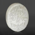 A PHOENICIAN GRAY CHALCEDONY SCARABOID WITH EGYPTIANIZING MOTIFS - Auction archive