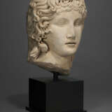 A ROMAN MARBLE HEAD OF THE EROS OF CENTOCELLE - фото 2