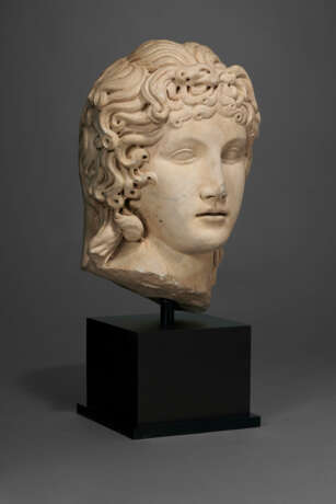 A ROMAN MARBLE HEAD OF THE EROS OF CENTOCELLE - photo 2