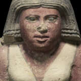 AN EGYPTIAN PAINTED LIMESTONE FIGURE OF A WOMAN - фото 4