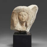 AN EGYPTIAN LIMESTONE PORTRAIT HEAD OF A WOMAN - photo 1