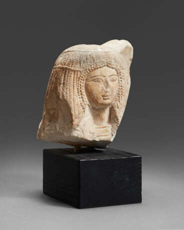 AN EGYPTIAN LIMESTONE PORTRAIT HEAD OF A WOMAN - photo 2