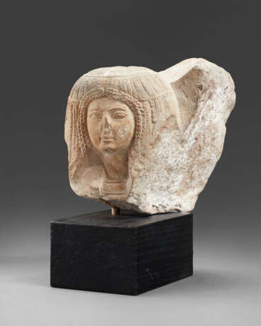 AN EGYPTIAN LIMESTONE PORTRAIT HEAD OF A WOMAN - photo 3