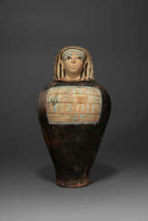 AN EGYPTIAN PAINTED TERRACOTTA CANOPIC JAR FOR MENTU-NAKHTE