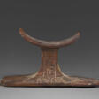 AN EGYPTIAN INSCRIBED WOOD HEADREST - Auction prices