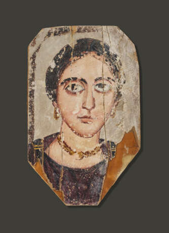 AN EGYPTIAN PAINTED WOOD MUMMY PORTRAIT OF A WOMAN - фото 1