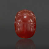 AN ETRUSCAN CARNELIAN SCARAB WITH A YOUTH WITH A STRIGIL - photo 3