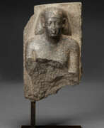 Granite. AN EGYPTIAN GRANITE PORTRAIT BUST OF A MAN