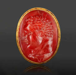 A GREEK GOLD AND CARNELIAN FINGER RING WITH HERAKLES