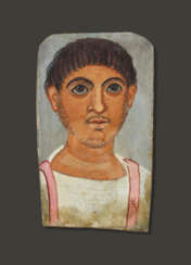 AN EGYPTIAN PAINTED WOOD MUMMY PORTRAIT OF A YOUNG MAN