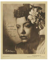 Two photographs signed