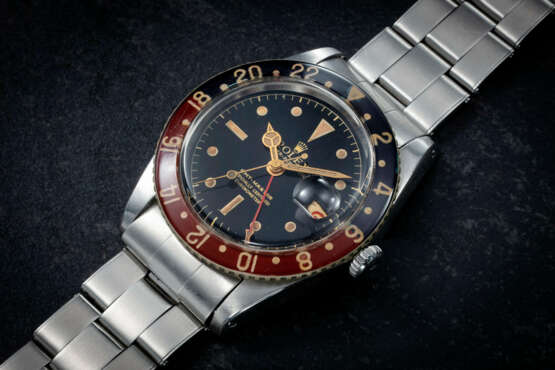 ROLEX, GMT-MASTER REF. 6542 'BAKELITE', A RARE AND IMPORTANT STEEL DUAL TIME WRISTWATCH - photo 1