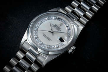 ROLEX, DAY-DATE REF. 18206, A PLATINUM AND DIAMOND WRISTWATCH WITH MOTHER OF PEARL DIAL