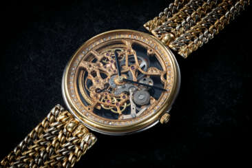 GÉRALD GENTA REF. G1513, A FINE TWO-TONE GOLD SKELETONISED WRISTWATCH WITH DIAMOND OUTER MINUTE TRACK INLAY 