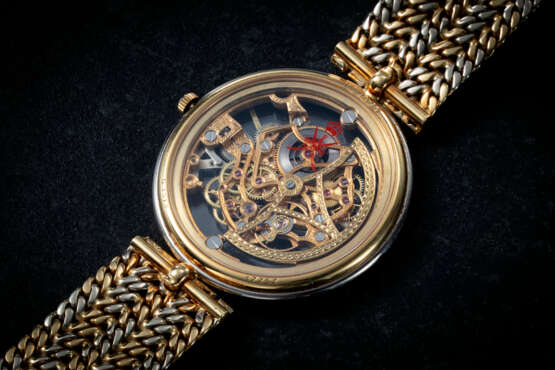 GÉRALD GENTA REF. G1513, A FINE TWO-TONE GOLD SKELETONISED WRISTWATCH WITH DIAMOND OUTER MINUTE TRACK INLAY - фото 2