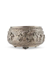 A repoussed silver bowl
