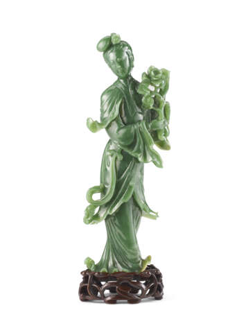A nephrite jade carving of a female figure - фото 1