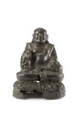 A bronze Budai with traces of partial gilting