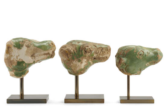 A group of three ceramic green glazed animal heads - фото 1