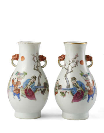 A pair of famille rose porcelain vases decorated with figures - photo 1