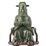 A large spinch green nephrite jade figure od a Daoist deity - фото 1