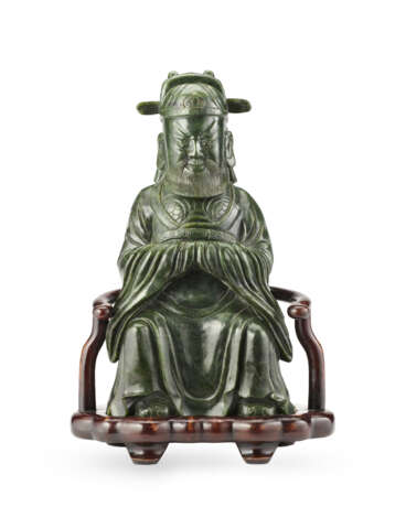 A large spinch green nephrite jade figure od a Daoist deity - фото 1