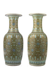 A pair of baluster vases each ovoid body rising to a tall trumpet neck