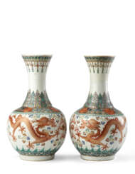 A pair of porcelain dragon vases