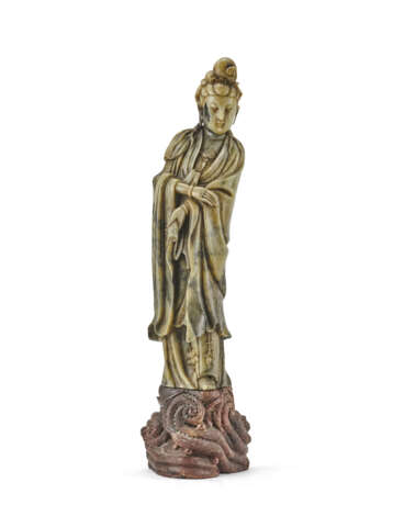 A soapstone Guanyin standing on a rock - photo 1