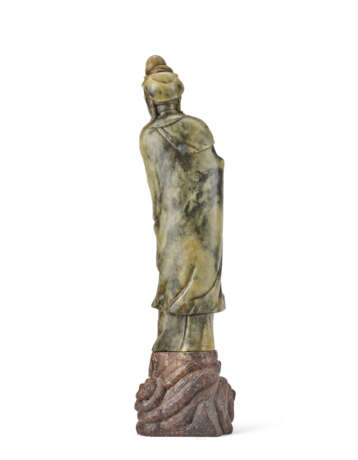 A soapstone Guanyin standing on a rock - photo 2