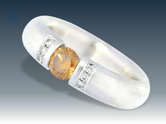 Ring: solid and high quality gold ring is forged with rare color diamond
