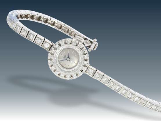 Armbanduhr: dekorative, komplett mit Brillanten besetzte Damenuhr aus den 70er-Jahren, 18K Weißgold - photo 1