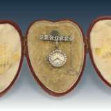 Anhängeuhr/Broschenuhr: seltene und hochfeine Art déco Diamant-Uhr mit Platingehäuse und Brosche sowie Originalbox, Thomas Elliott London, um 1930 - фото 1