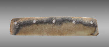 A DAO, OR KNIFE-SHAPED BLADE, WITH FIVE FASTENING HOLES, CARVED FROM A MULTI-COLOURED JADE WITH A WHITE STRIPE