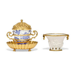 A SILVER-GILT-MOUNTED SEVRES PORCELAIN BLUE AND WHITE BEAKER, SILVER-GILT MANCERINA AND COVER AND A GILT-METAL-MOUNTED SAINT CLOUD WHITE PORCELAIN LIBATION CUP