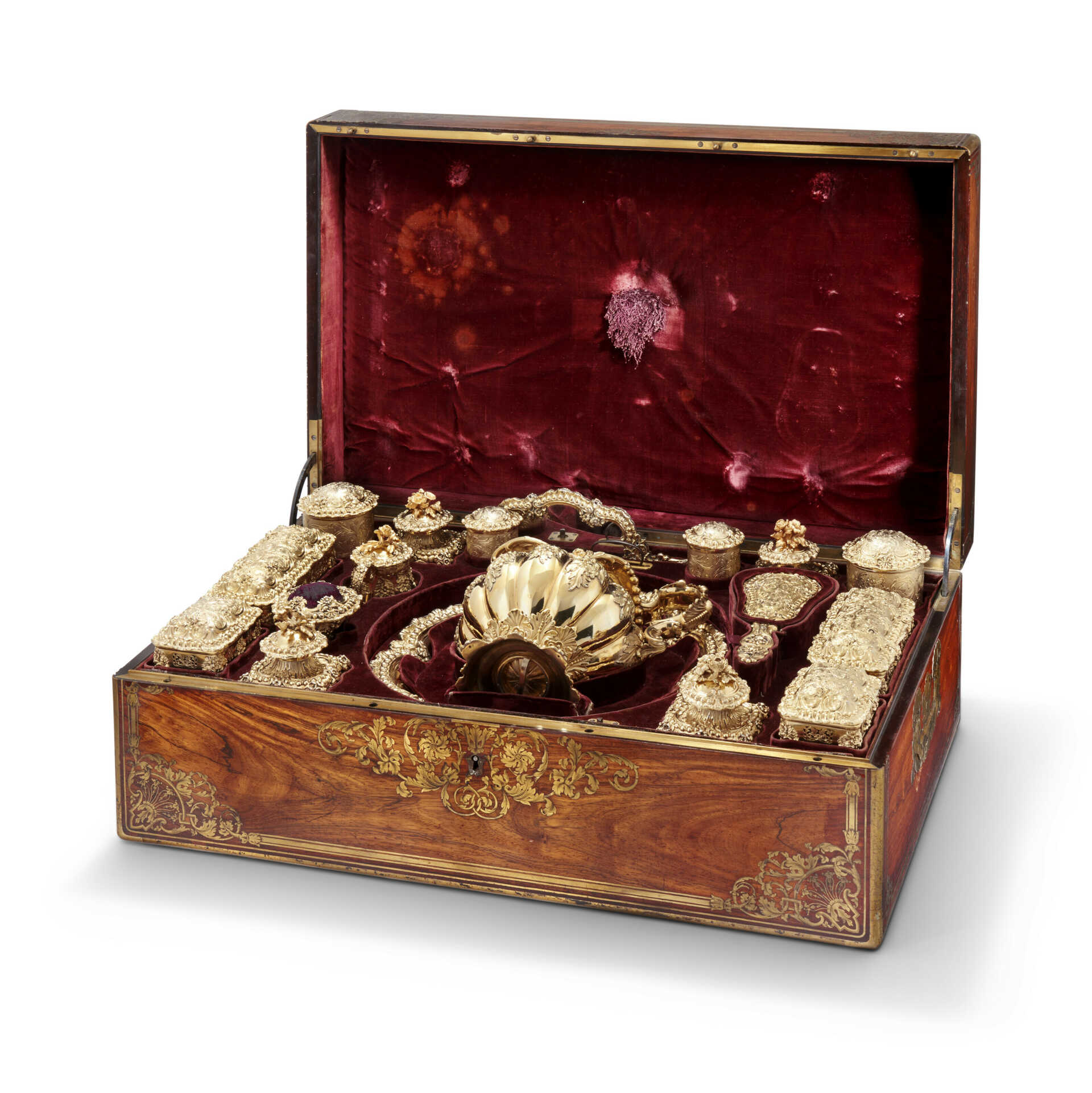 A FRENCH SILVER-GILT DRESSING TABLE SERVICE