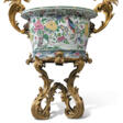 A LARGE FRENCH ORMOLU-MOUNTED CHINESE FAMILLE ROSE PORCELAIN JARDINIERE-ON-STAND - Auction prices