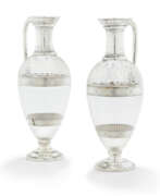 Carafes, Decanters, Jugs, Pitchers. A PAIR OF VICTORIAN SILVER-MOUNTED GLASS CLARET JUGS