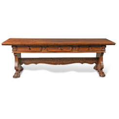 AN ITALIAN CARVED WALNUT REFECTORY TABLE