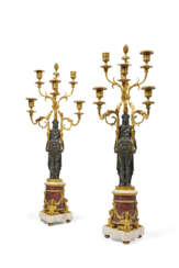 A PAIR OF LATE LOUIS XVI GILT AND PATINATED-BRONZE, WHITE MARBLE AND ROUGE GRIOTTE FIVE-BRANCH CANDELABRA