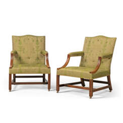 A PAIR OF GEORGE III MAHOGANY LIBRARY ARMCHAIRS