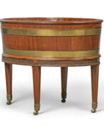 Thomas Chippendale. A GEORGE III BRASS-BOUND MAHOGANY WINE COOLER